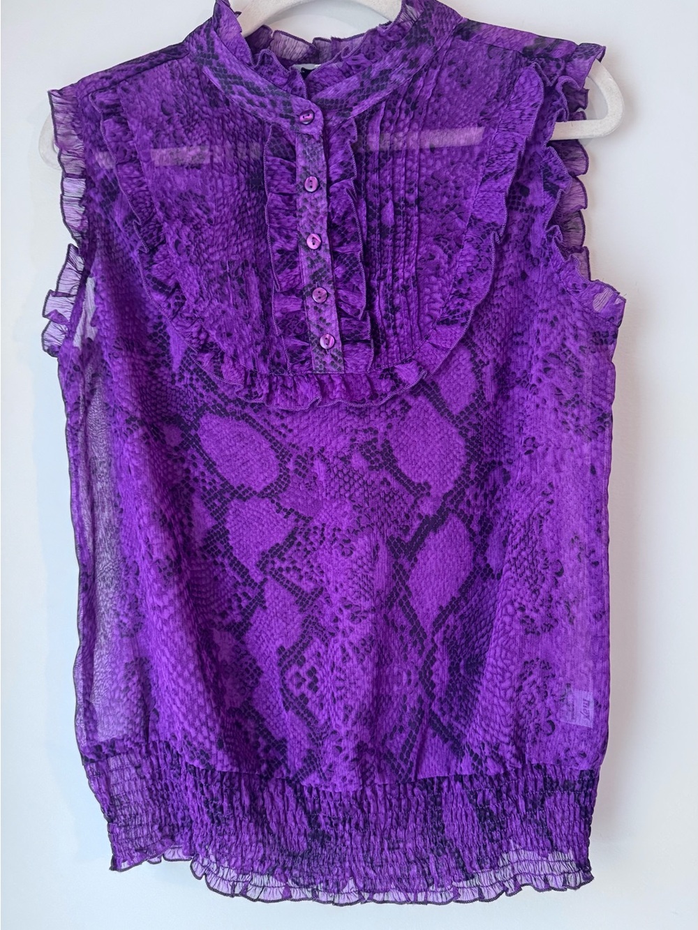 Magenta Ruffle Front Sleeveless sheer Blouse with elastic rushing hem